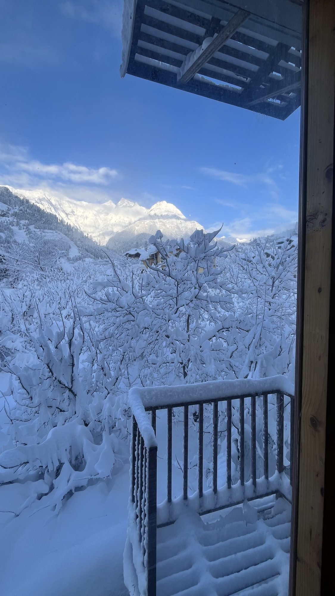 Blue sky over the snowy balcony